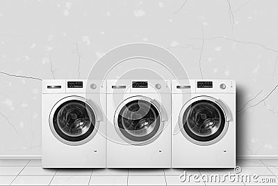 Home appliance - Three washing machine in home interier Stock Photo