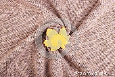 Home autumn background of yellow gingerbread leaves on a soft wool blanket top view, space for text Stock Photo