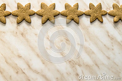 Home-baked gingerbread on a kitchen surface with baking paper Stock Photo