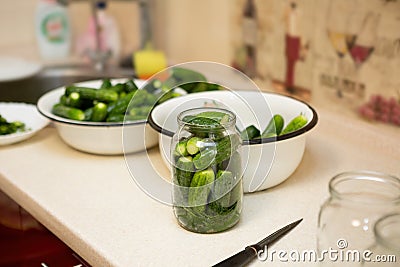 Home canning of organic vegetables. Preparing cucumbers Stock Photo