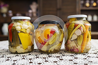 Home Canning of Summer Vegetables Stored on the Table. Stock Photo