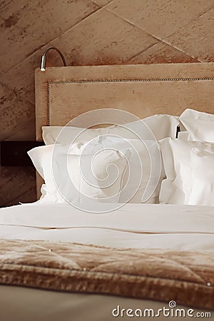 Home decor and interior design, bed with white bedding in luxury bedroom, bed linen laundry service and furniture detail Stock Photo