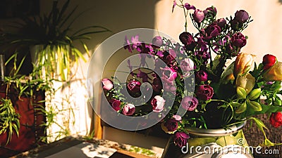 Home decor interior design with flowers on the table. Stock Photo