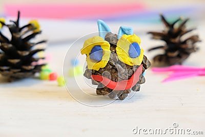 Home Education game with clay and nature material, Funny face from colorful plasticine, Early development concept. Educational Stock Photo