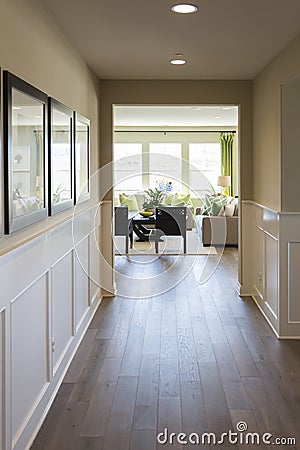 Home Entry Way with Wood Floors and Wainscoting Stock Photo