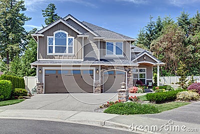 Home exterior with garage and driveway Stock Photo