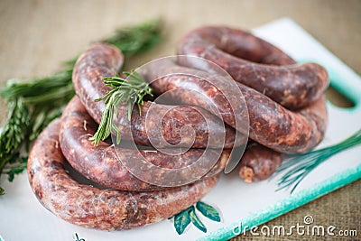 Home hepatic raw sausage with rosemary Stock Photo