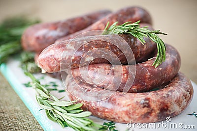 Home hepatic raw sausage with rosemary Stock Photo