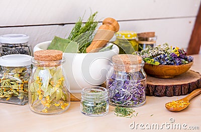 Home herbal apothecary concept. Lot of different dry herbal remedies. Stock Photo