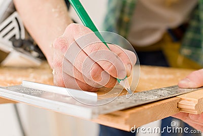 Home improvement - handyman prepare wooden floor Stock Photo