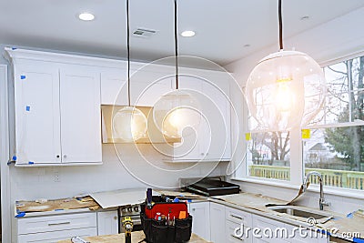 Home Improvement Kitchen Remodel worm& x27;s view installed in new kitchen Stock Photo