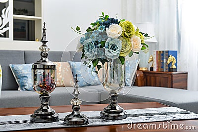 Home interior decor,metal , bouquet in glass vase Stock Photo