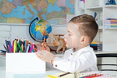 Home kids learning, home school. Kid in class on background of blackboard. Education. Home schooler. Cute little boy Stock Photo