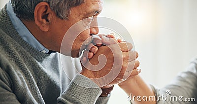 Home, kissing hand and senior couple with love, marriage and romance with celebration, bonding together and care Stock Photo