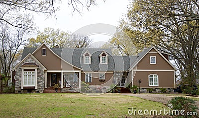 Home Made with Cobblestone and Brown Stucco. Stock Photo