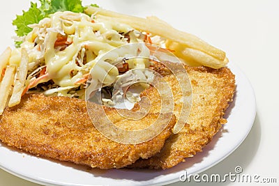 Home made fish&chip with salad on white dish Stock Photo