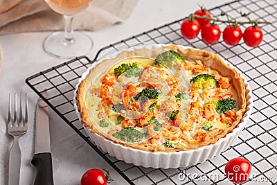 Home made french tart quiche with crayfish and broccoli filled with cream and eggs Stock Photo