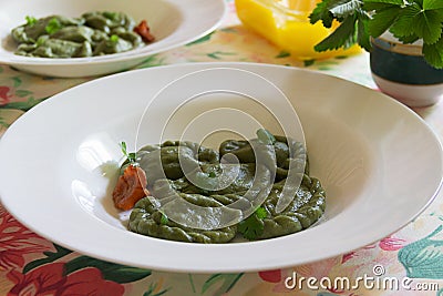 Home-made green dumplings Stock Photo