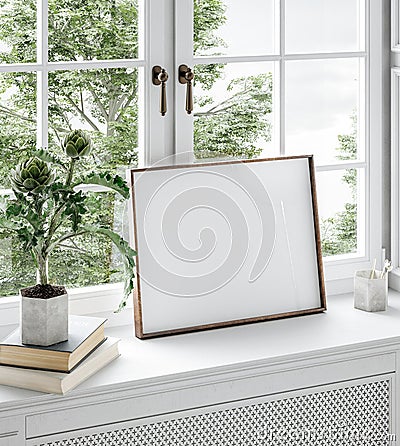 Home mockup, frame close up standing on windowsill with flower and books Stock Photo