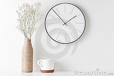 Home office minimal workspace desk with wall clock Stock Photo