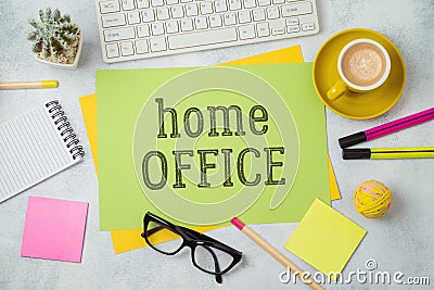 Home office and working from home concept. Table workplace with paper note, keyboard computer and notepad. Top view from above Stock Photo