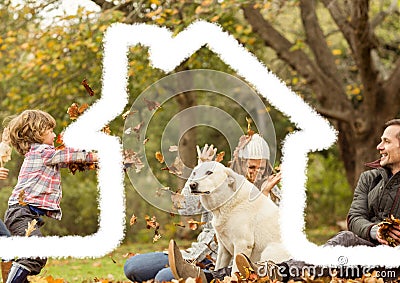 Home outline with family having fun in background Stock Photo