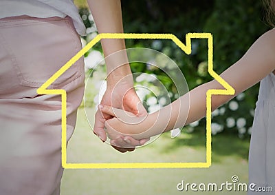 Home outline with mother and daughter holding hands in background Stock Photo