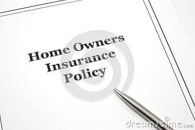 Home Owners Insurance Policy with a pen Stock Photo