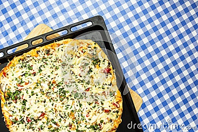 Home pizza on a baking sheet Stock Photo