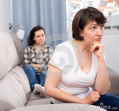 Home quarrel between friends woman Stock Photo