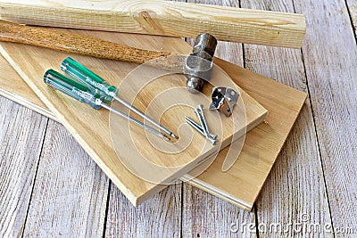 Simple workshop tools and lumber for handcrafted woodworking projects Stock Photo