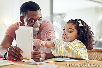 Home school, learning and father helping his child with flash cards, homework or studying. Education, knowledge and Stock Photo