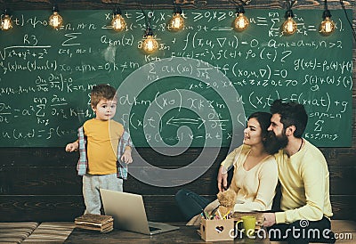 Home schooling. Home schooling pupil at chalkboard. Home schooling education with parents. Family choose home schooling Stock Photo