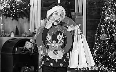 Home shopping. Small girl with shopping bags. Delivering joy. Best offer of season. Sales and discounts. Little girl Stock Photo