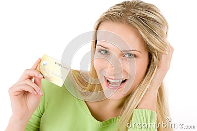 Home shopping - young woman holding credit card Stock Photo