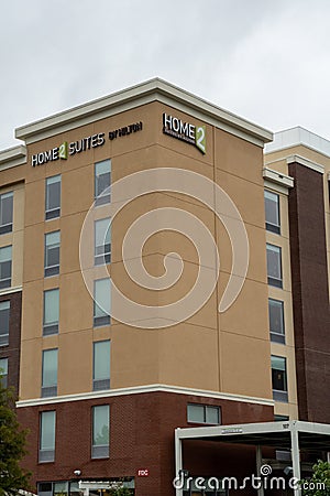 Home 2 Suites Hotel against cloudy sky Editorial Stock Photo