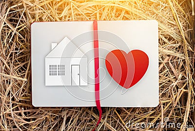 Home sweet home house drawing with red heart on notebook Stock Photo