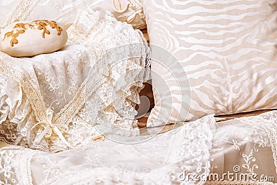 Home textiles. Various pillows and bedspreads Stock Photo