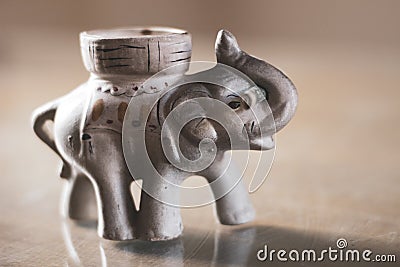 Elephant of fortune with dollar in his trunk Stock Photo