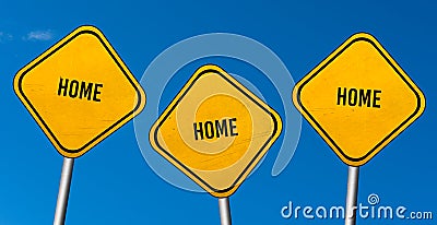 Home - yellow signs with blue sky Stock Photo