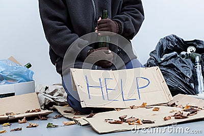 Homeless alcoholic holding a bottle Stock Photo