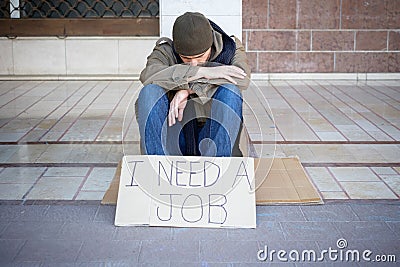Homeless asking for charity Stock Photo