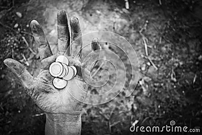 Homeless begging hand of man with money Stock Photo