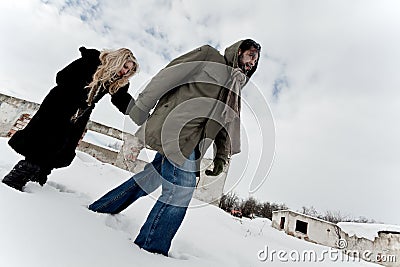 Homeless couple struggle in winter Stock Photo