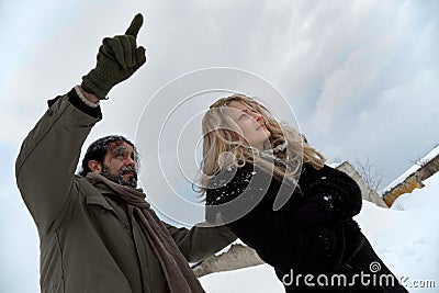 Homeless couple in winter time Stock Photo