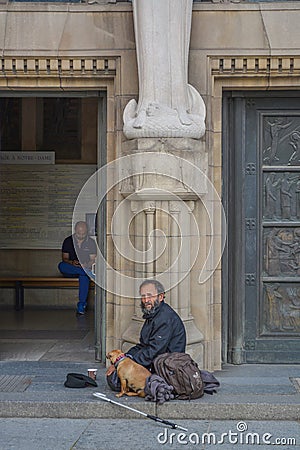 Homeless and dog sitting on church Editorial Stock Photo