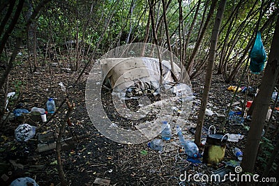 Homeless doweling. Small habitation, tent made from garbage Stock Photo