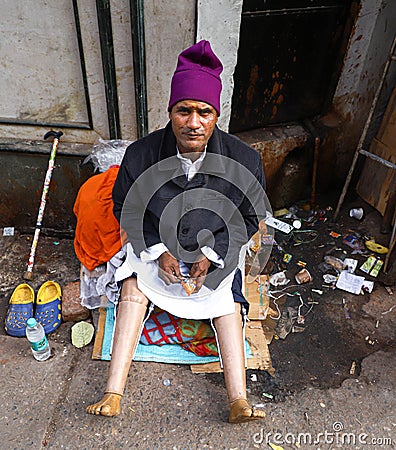 Homeless Indian senior handicapped beggar Editorial Stock Photo