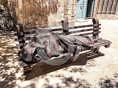 The Homeless Jesus and the Santa Anna Church in Barcelona Editorial Stock Photo