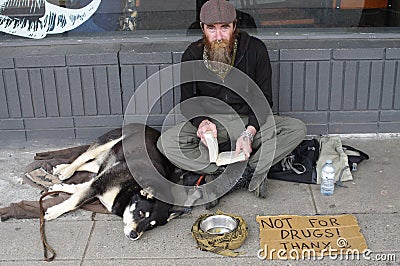 Man begging for money on the street Editorial Stock Photo